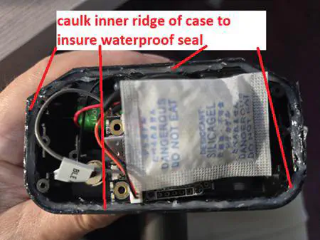 Thin bead of silicone around the case edge